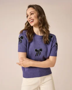 Pullover mit Schleifen und Steinchen