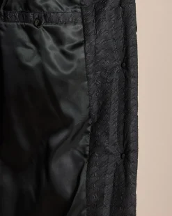 Steppmantel mit Kettendetail